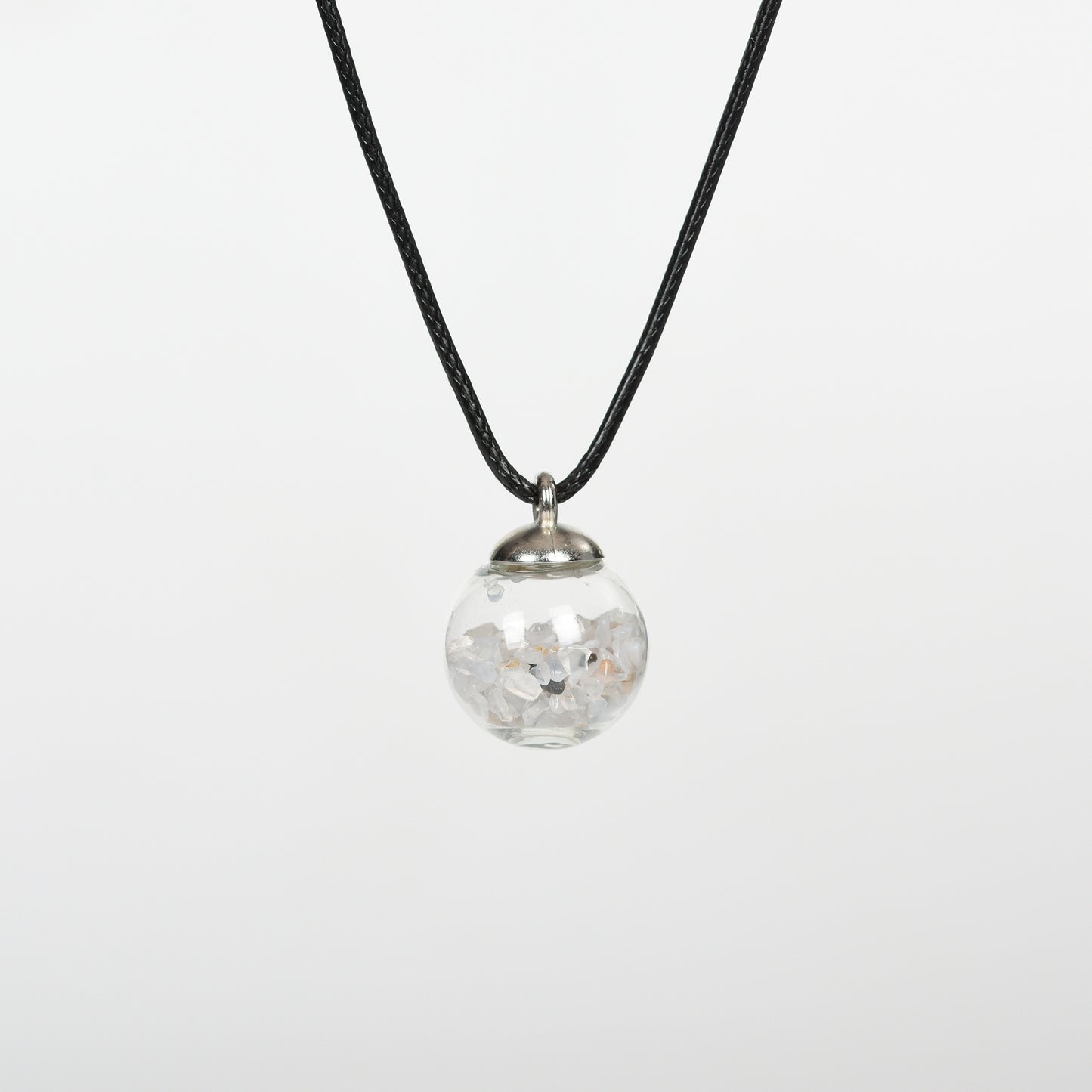 Chips in glass sphere pendant