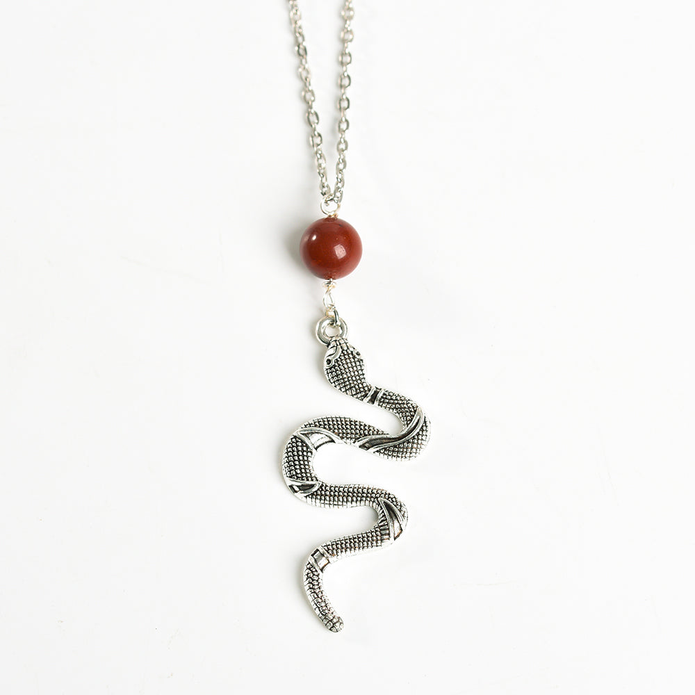 Metal snake with crystal beads pendant