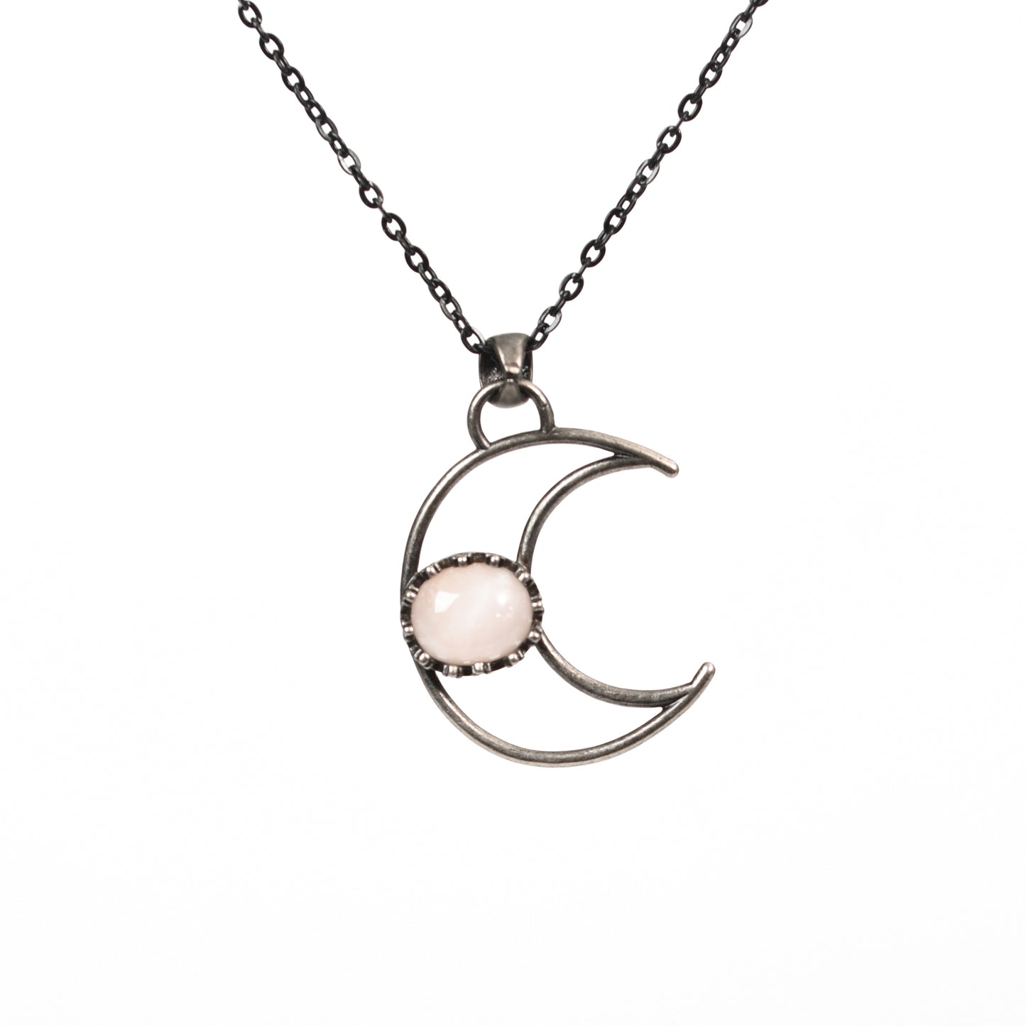 Metal moon with oval crystal pendant