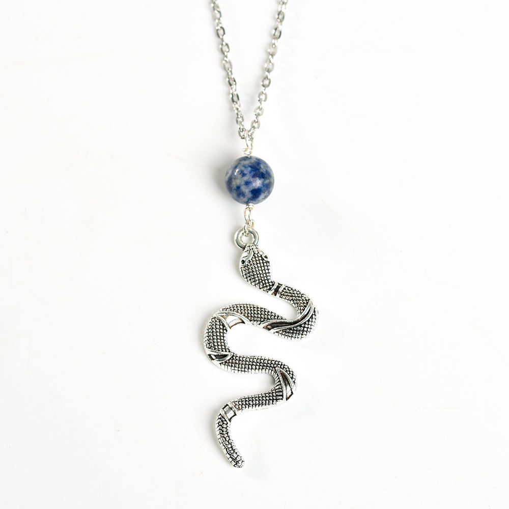 Metal snake with crystal beads pendant