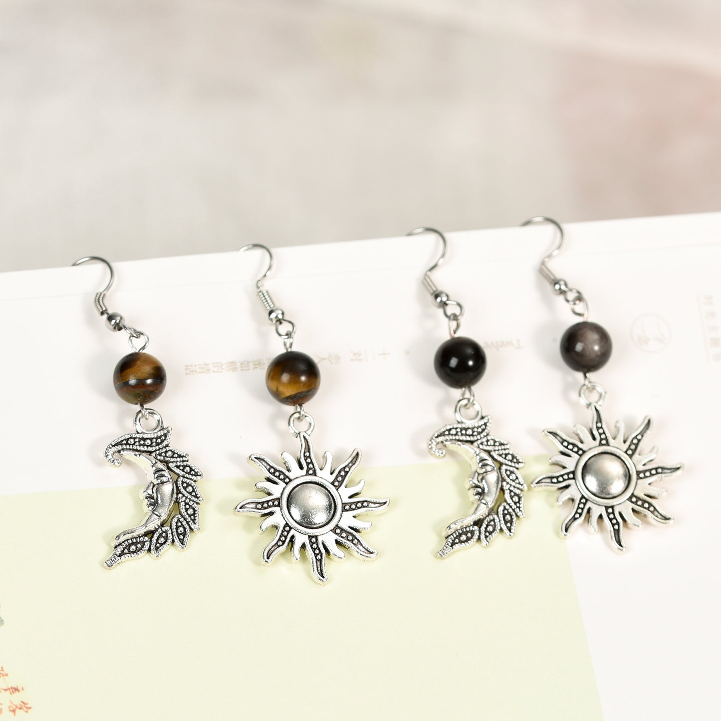 Metal sun and moon with beads earrings