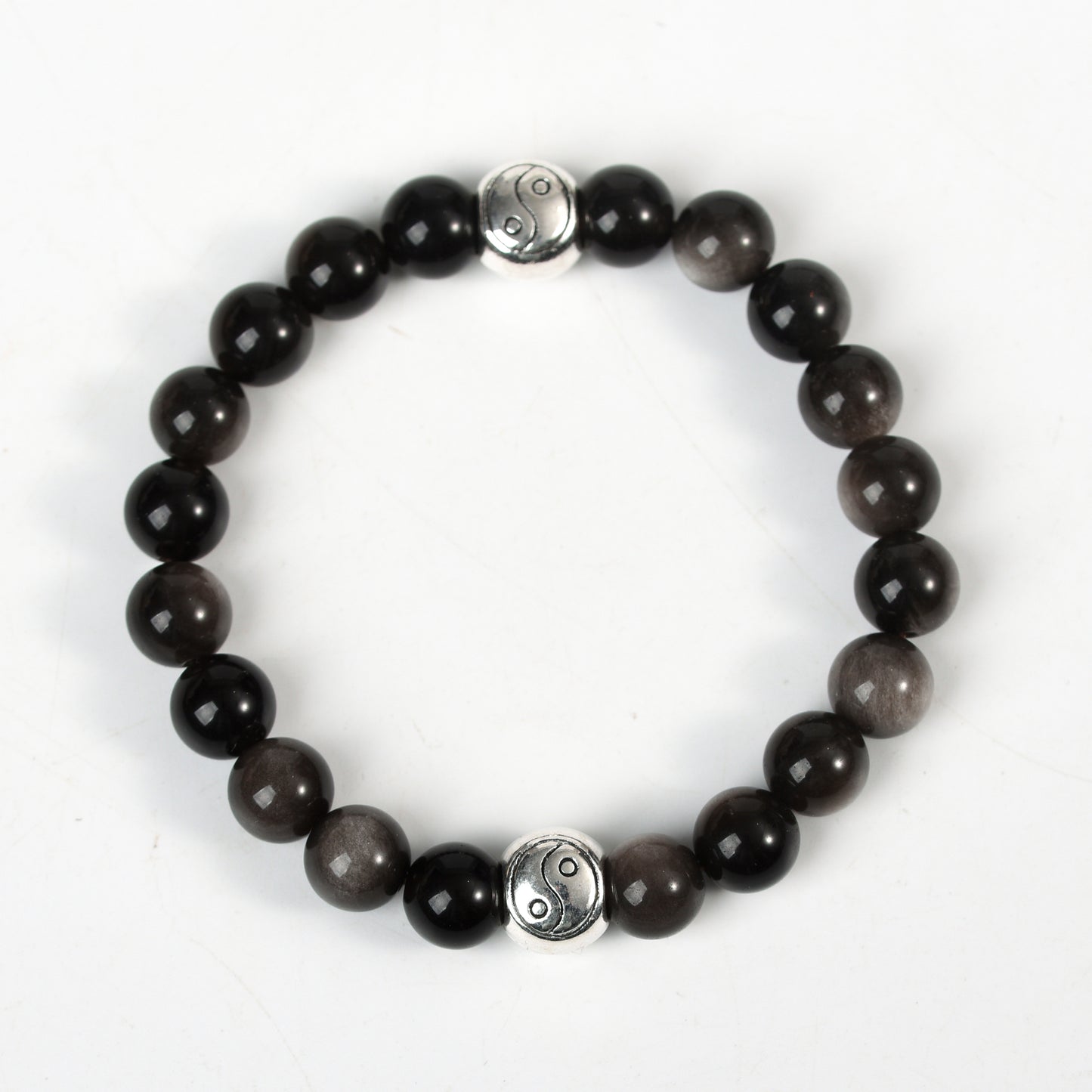 Metal charm with sliver obsidian bracelet