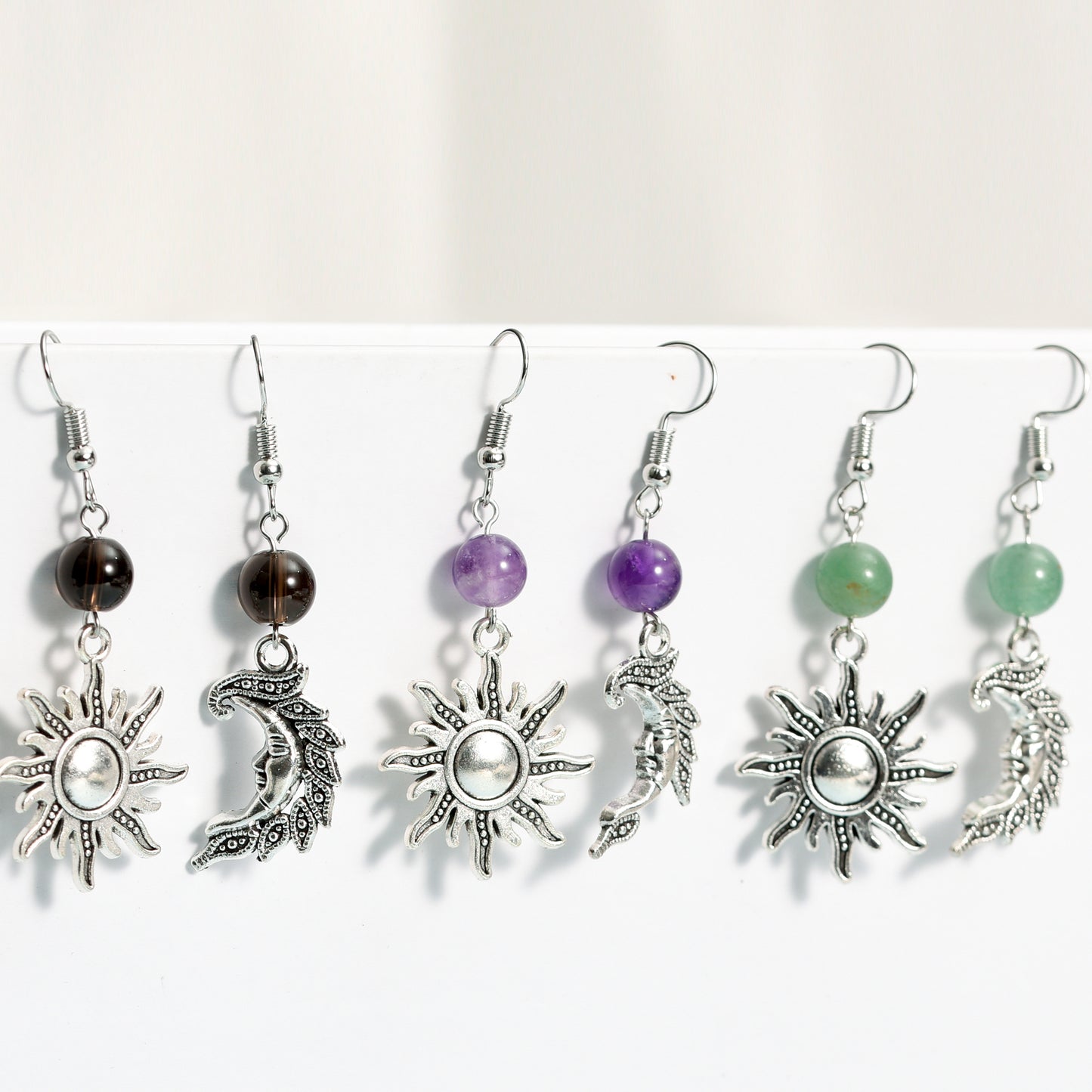 Metal sun and moon with beads earrings