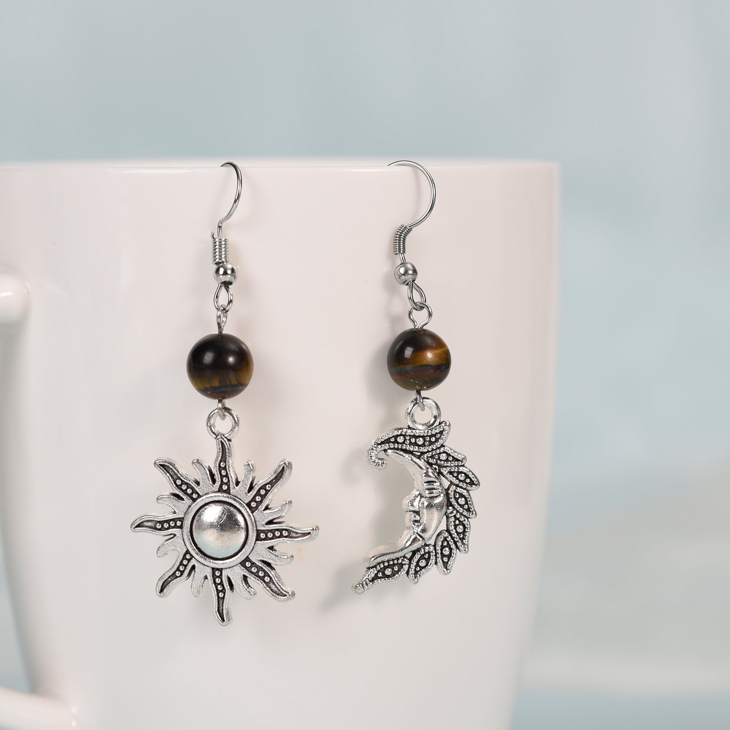 Metal sun and moon with beads earrings