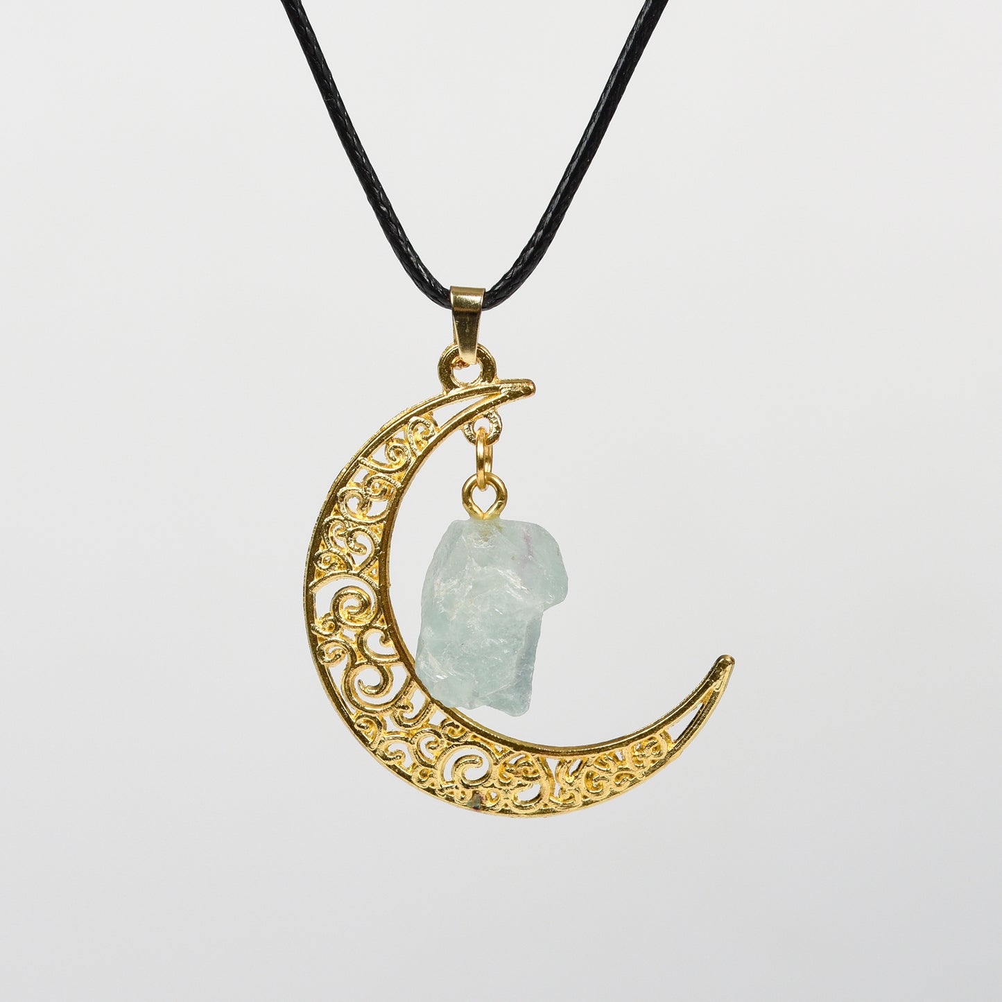 Raw crystal with moon pendant