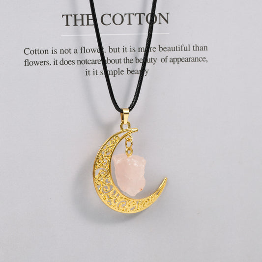 Raw crystal with moon pendant