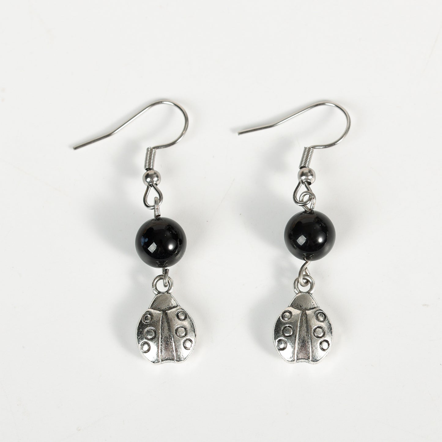 Metal lady bug with beads earrings