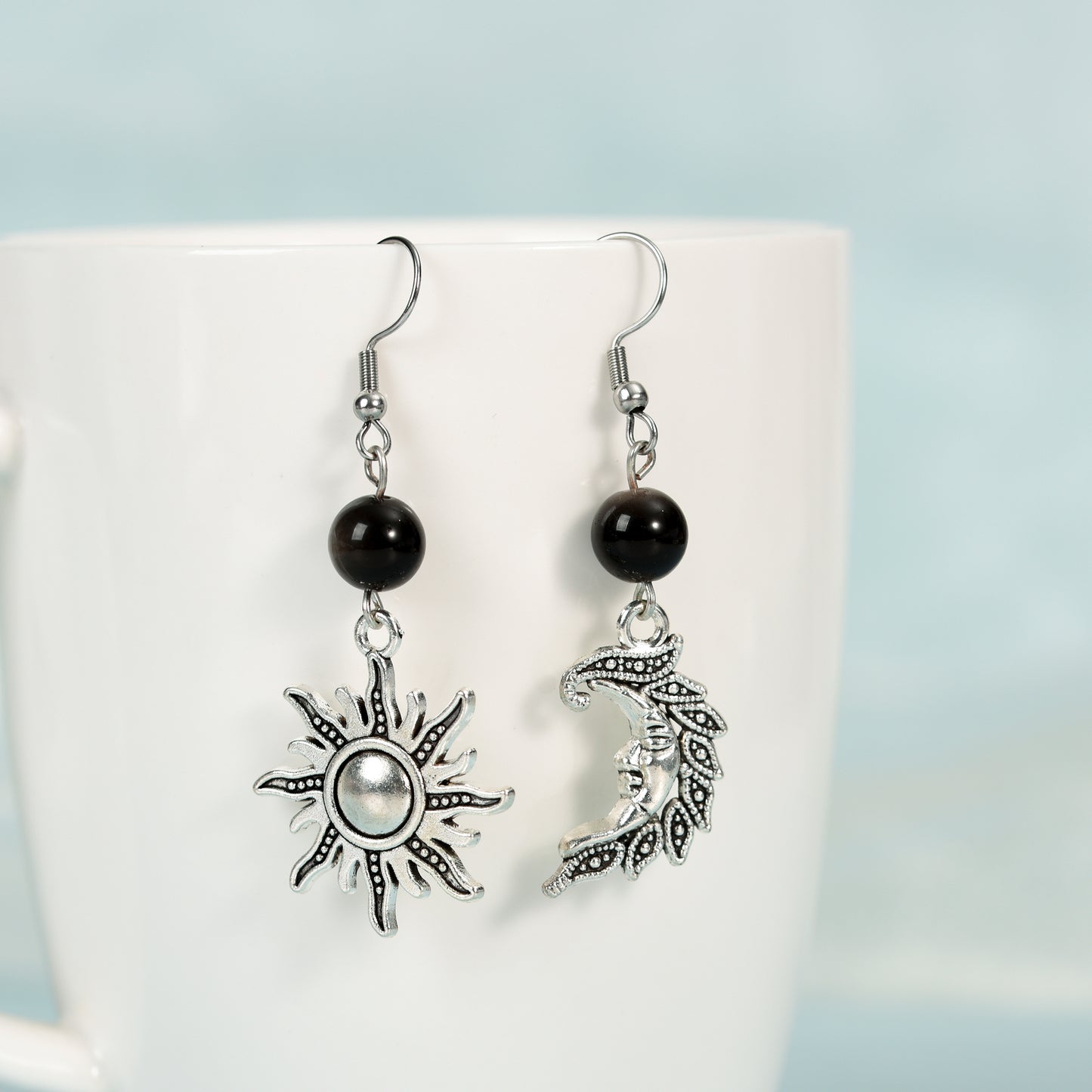 Metal sun and moon with beads earrings