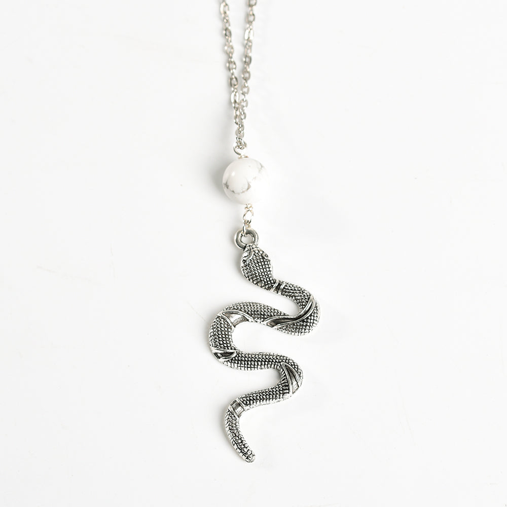 Metal snake with crystal beads pendant