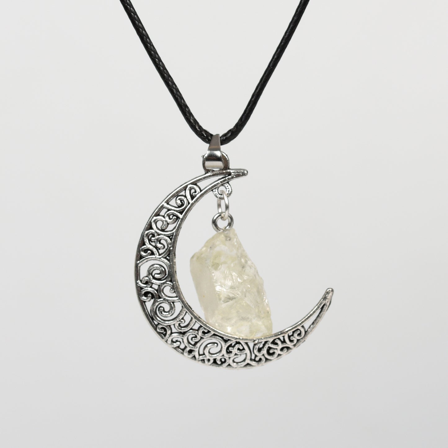 Raw crystal with moon pendant