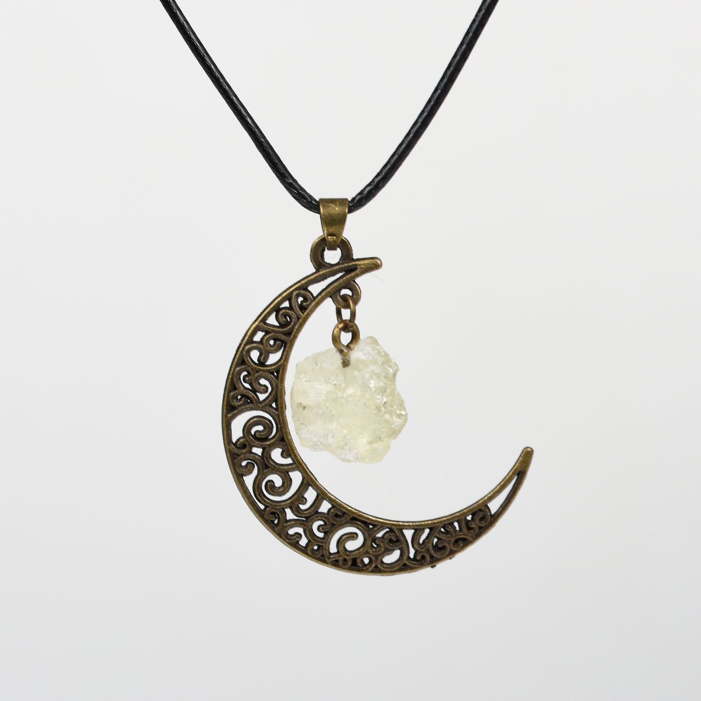 Raw crystal with moon pendant