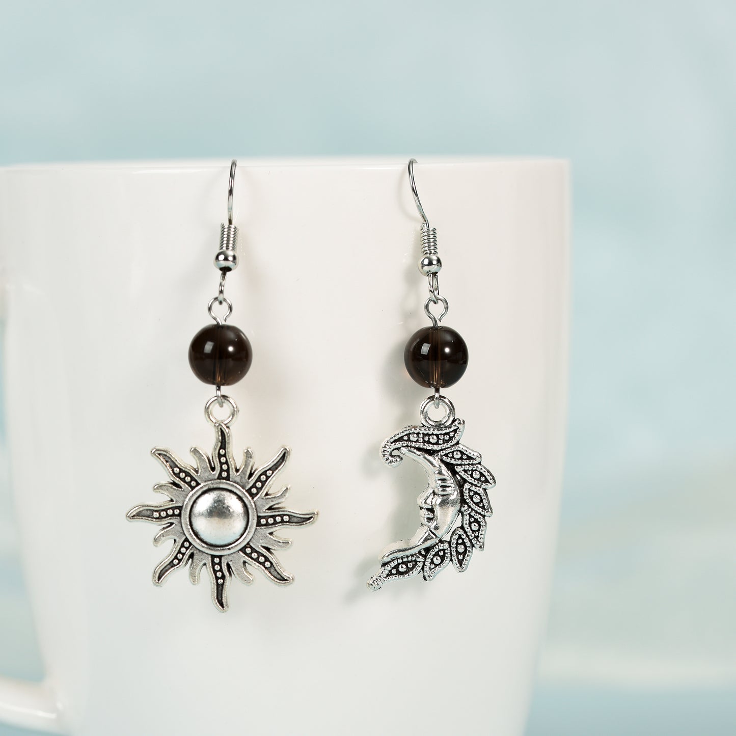 Metal sun and moon with beads earrings