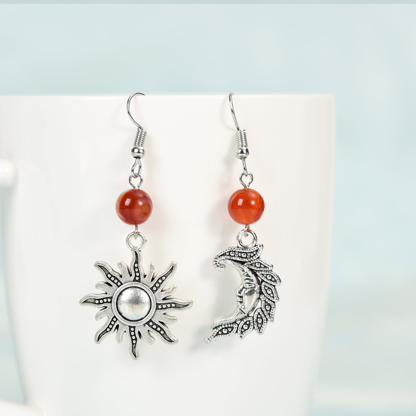 Metal sun and moon with beads earrings