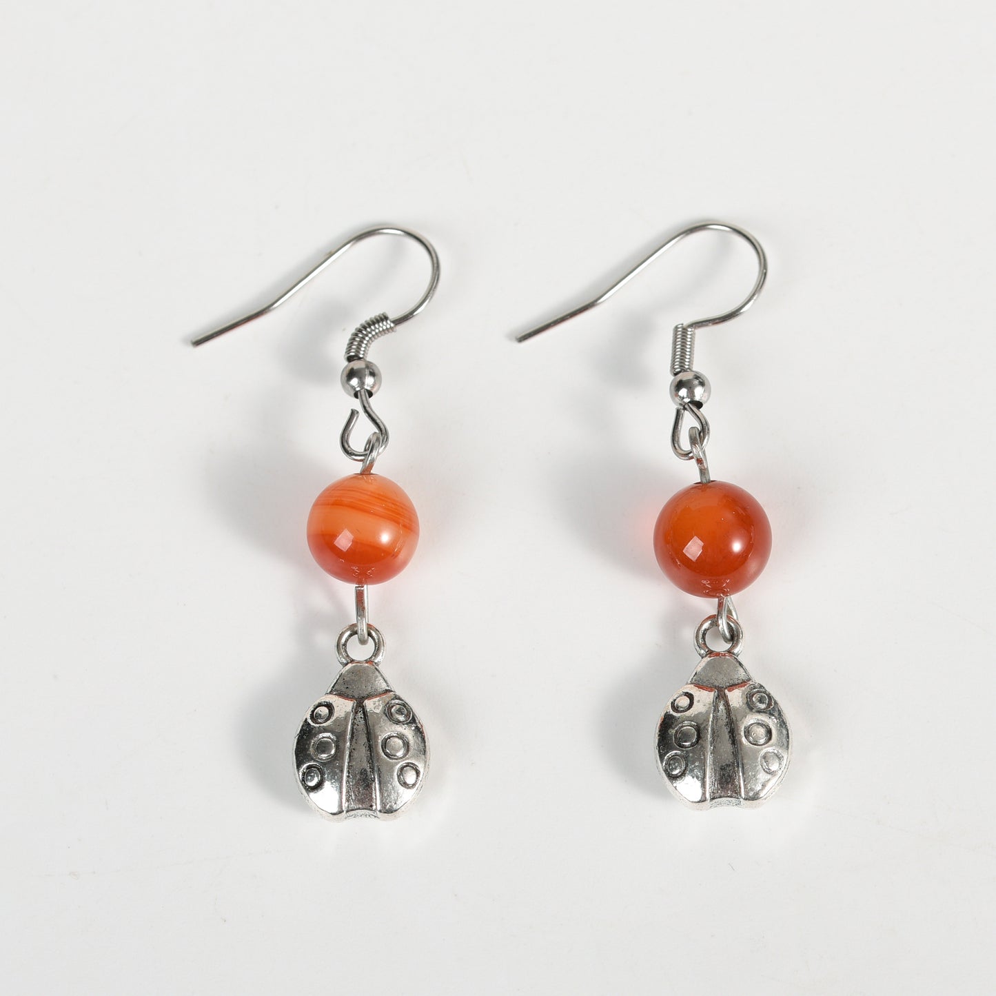 Metal lady bug with beads earrings