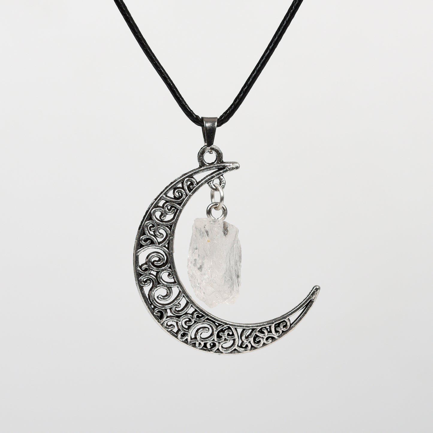 Raw crystal with moon pendant