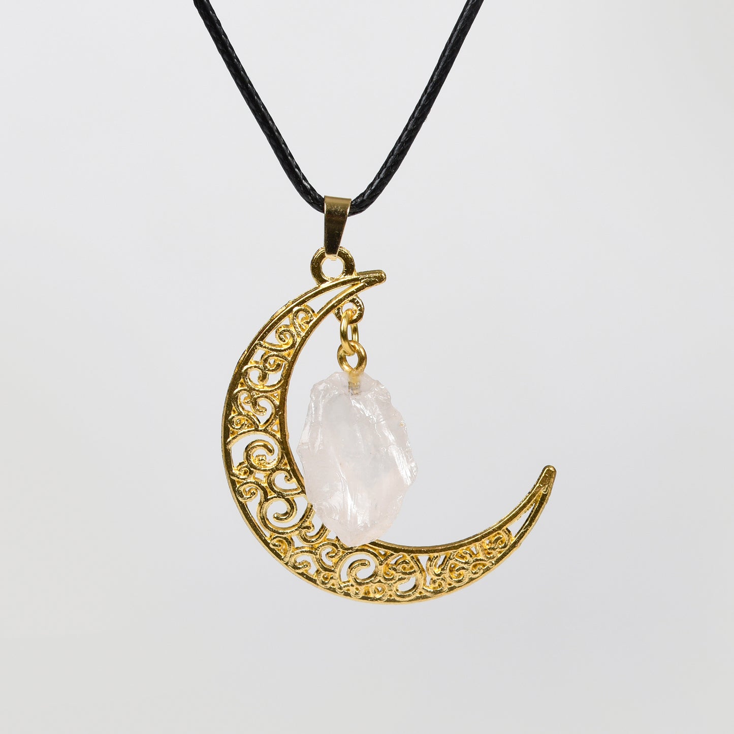 Raw crystal with moon pendant