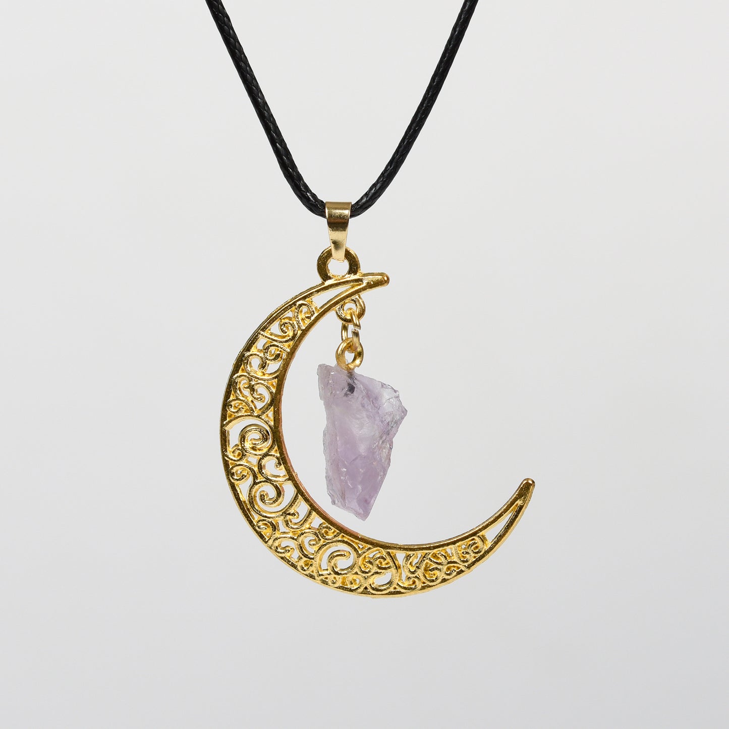 Raw crystal with moon pendant