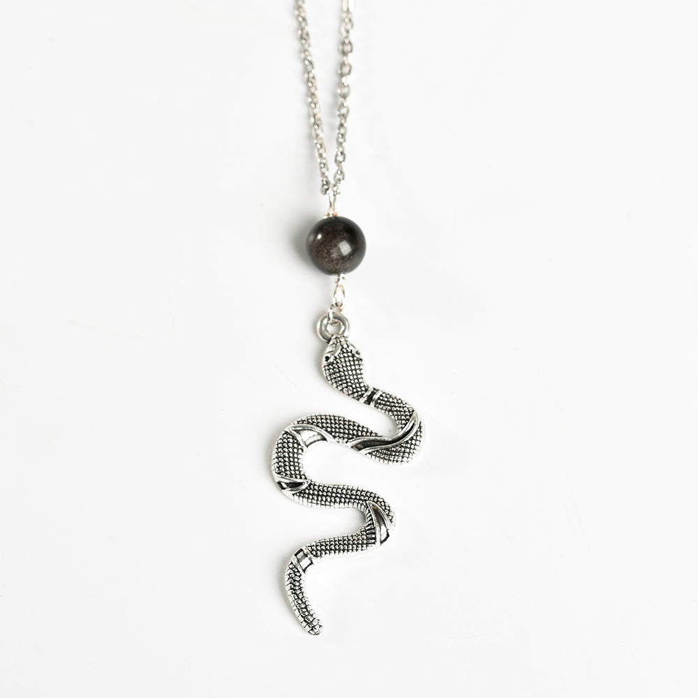 Metal snake with crystal beads pendant