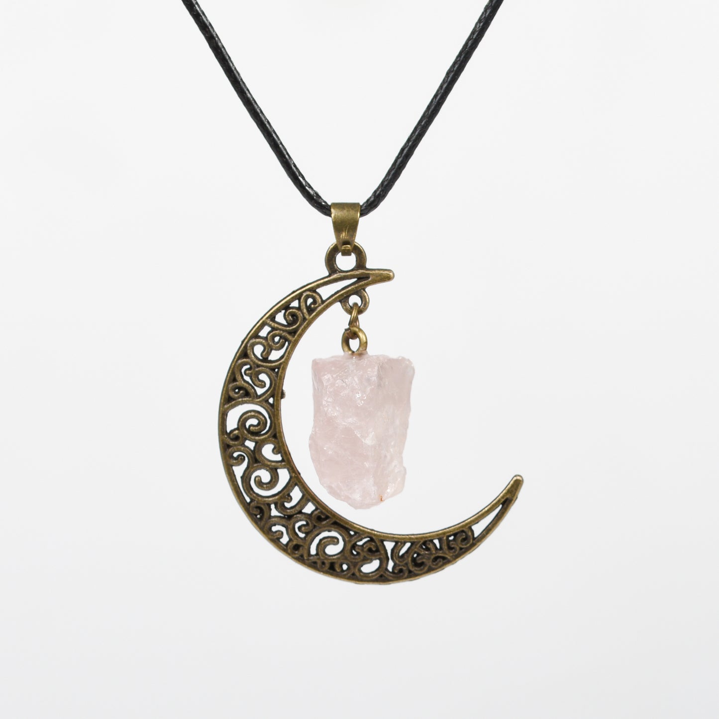 Raw crystal with moon pendant