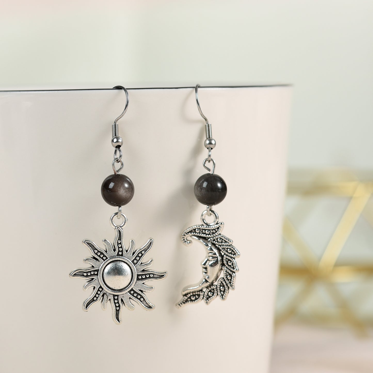 Metal sun and moon with beads earrings